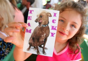 Wilder Larrain cheers for her favorite dog "Icky" during the World's Ugliest Dog Contest in 2013. (Conner Jay/The Press Democrat)